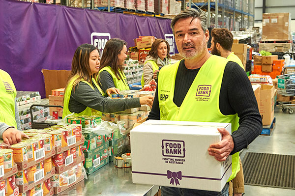 Photo of Foodbank workers packing boxes